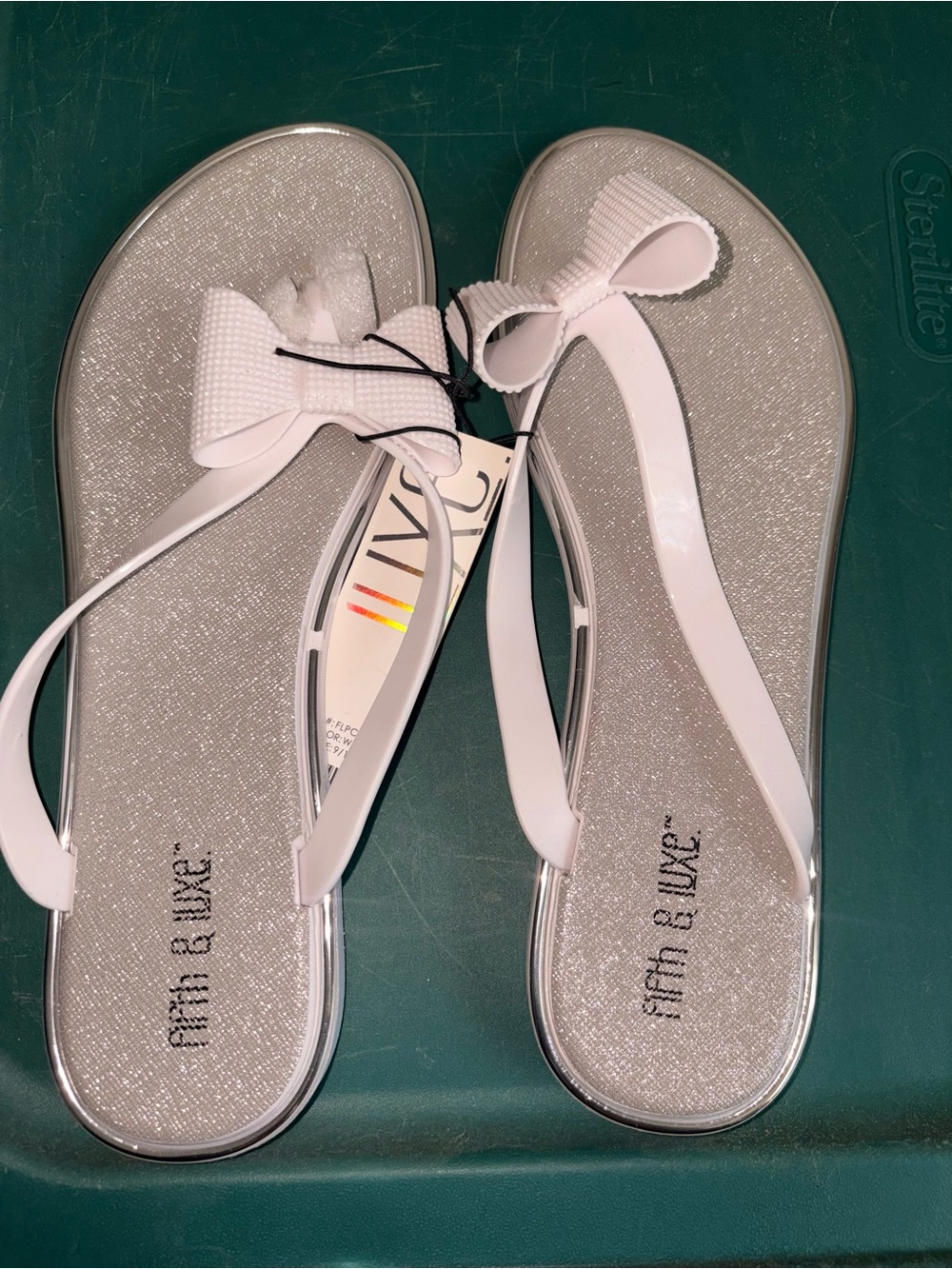 White Bow Glitter Jelly Flip Flops